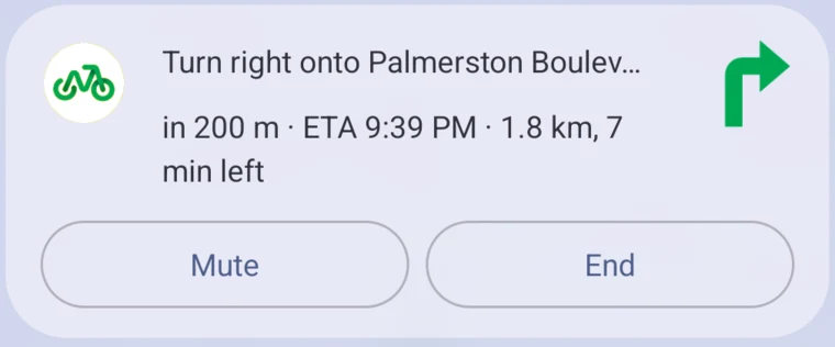 Cycle Now navigation notification: Turn right onto Palmerston Boulevard, in 200 m, ETA 9:39 PM, 1.8 km and 7 minutes left, with Mute and End buttons